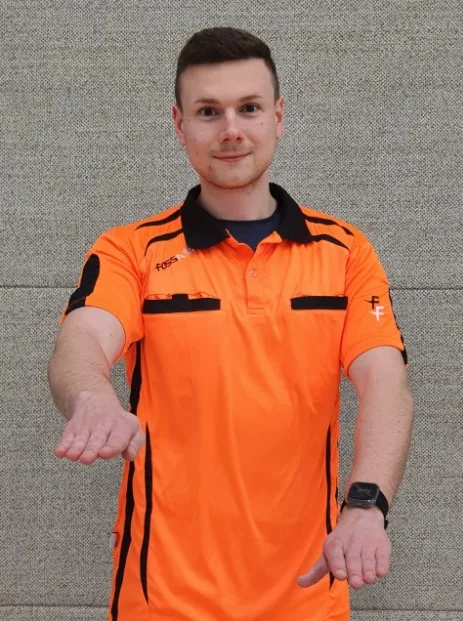 Schiedsrichterzeichen Prell- oder Tippfehler